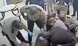 orrifying Moment US Police Smother Innocent Man to Death Caught on Camera