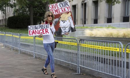 Tense Atmosphere: Subdued Crowd Gathers at Washington Courthouse for Trump's Arraignment